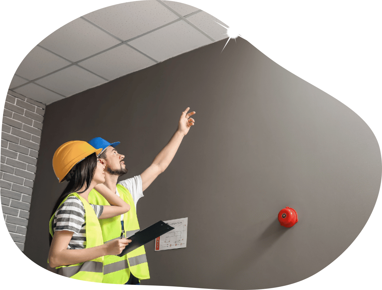 workers inspecting ceiling